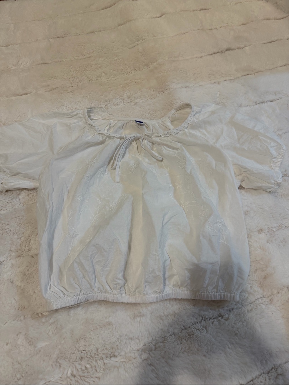 White Old Navy blouse with tie front detail, and embroidered designs size S